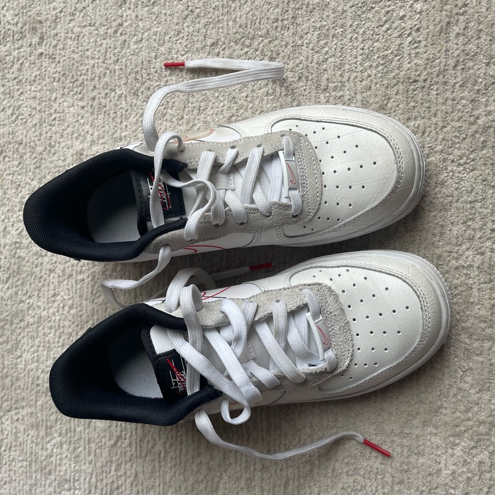 Nike Air Force 1 low script swoosh